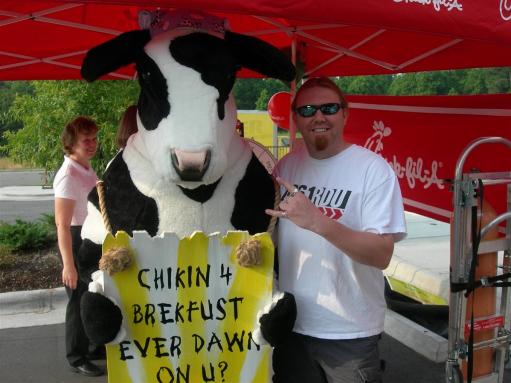Bryan with the Chik Fil A Mascot the cow